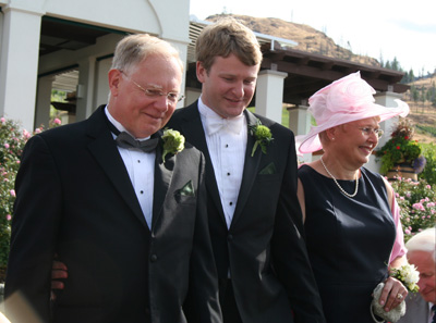 [ Huw walks down the aisle ]