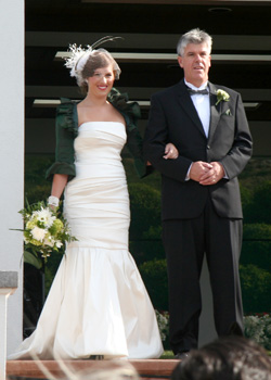 [ Kathryn walks down the aisle ]