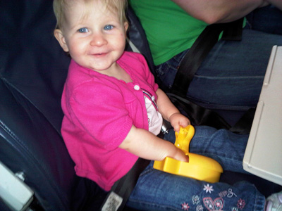 [ On the plane, with gold fish ]