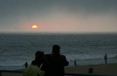 [ Sunset over the beach ]