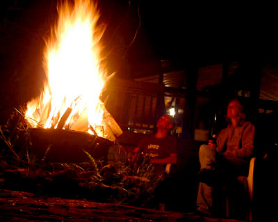 [ Sitting around the fire ]