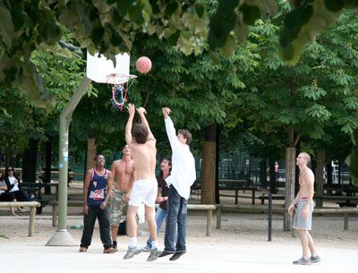 [ Parisian boys play some b-ball ]