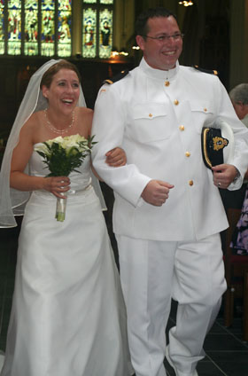[ Walking back down the aisle ]