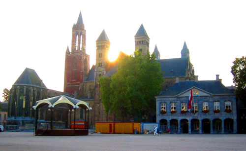 [ Sun setting behind church ]