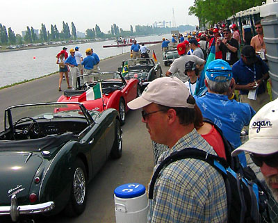 [

Drivers parade cars ]
