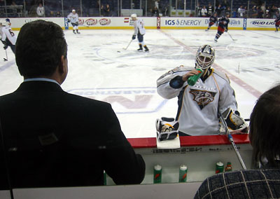 [ Over the coach's shoulder ]