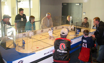 [ Giant table-hockey game ]