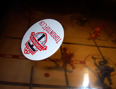 [ FC sticker on table hockey ]