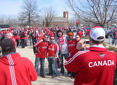 [ Toronto FC fans pose ]