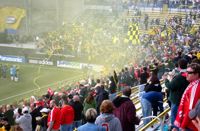 [ Columbus fans pop a flare ]