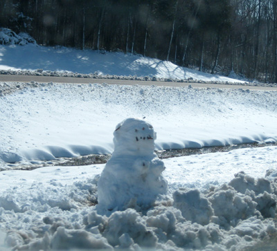 [ Snowman on the side of the road ]