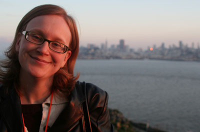 [ Emma in front of downtown ]