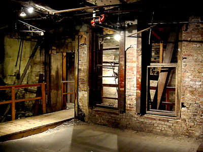 [ The basement, sort 

of. ]