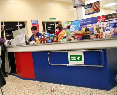 [ Sit-down checkout clerks ]